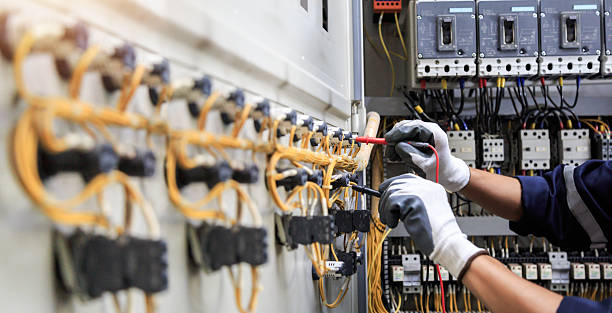 Professional Electrician technician working in Midfield, AL